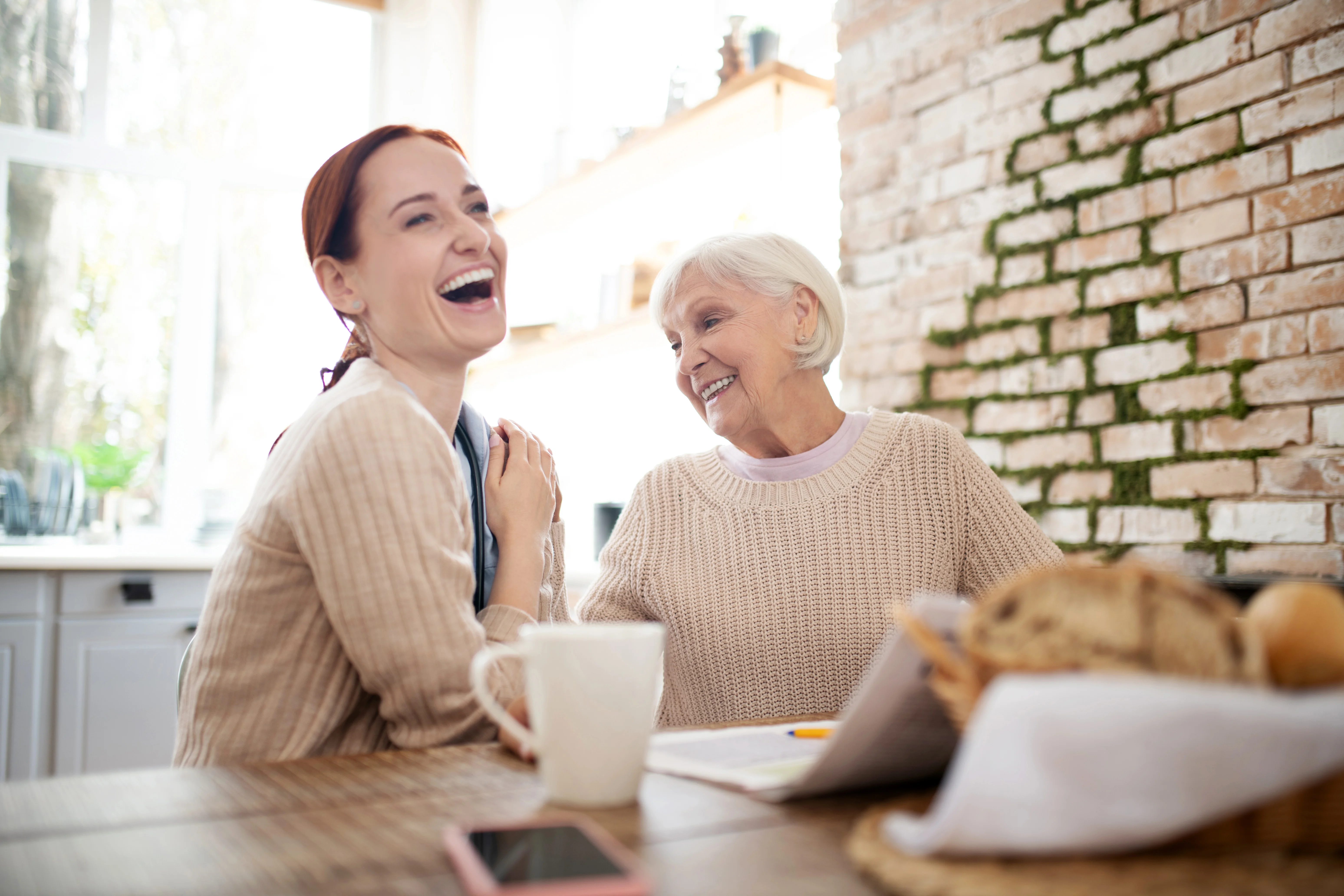 a couple of women laughing