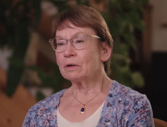 a woman wearing glasses