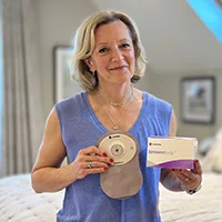 a woman holding a cd