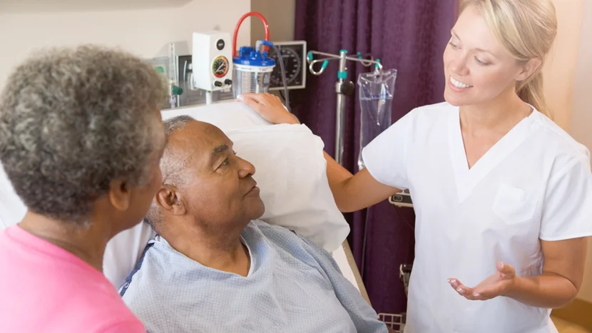 a doctor talking to a patient